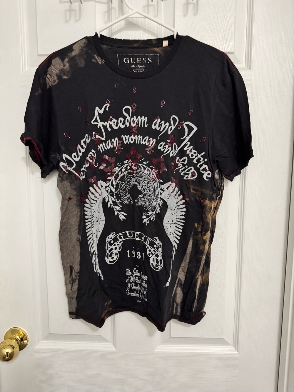 GUESS Y2K Black Graphic Winged Logo Tee with Bleach Accents